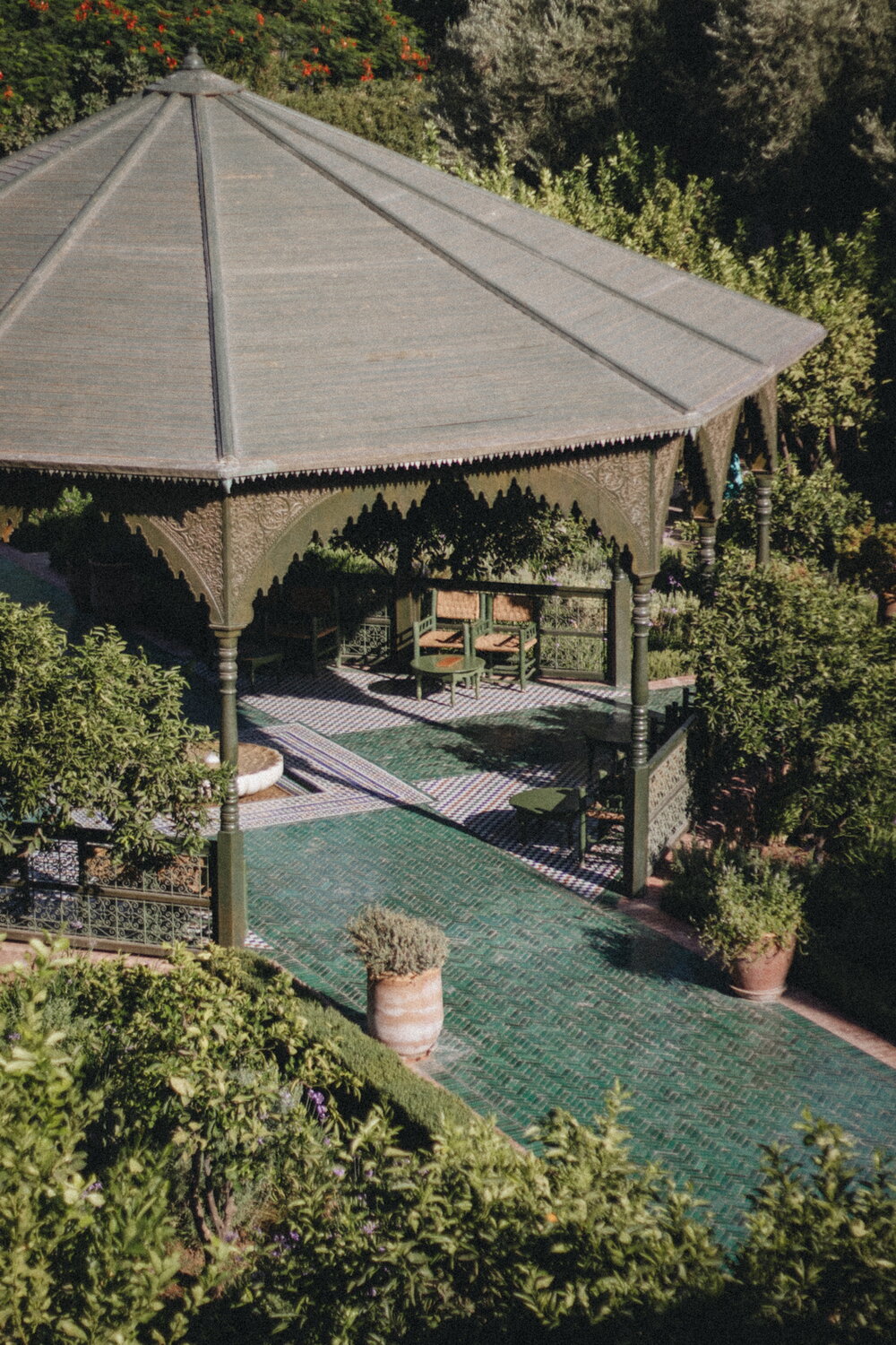 Green pavilion among the riad trees