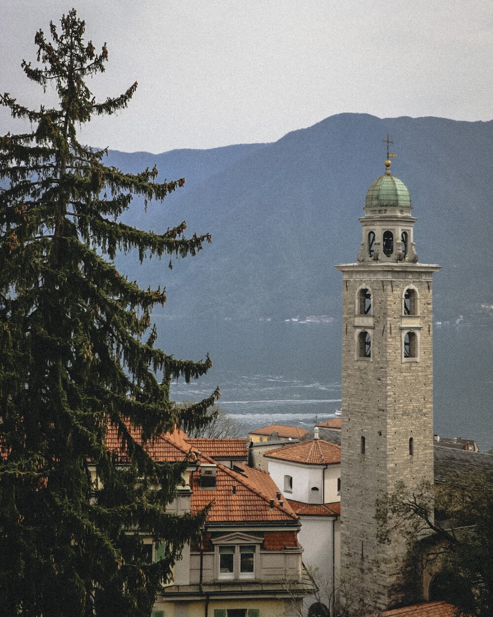Bell tower and lake in Lugano