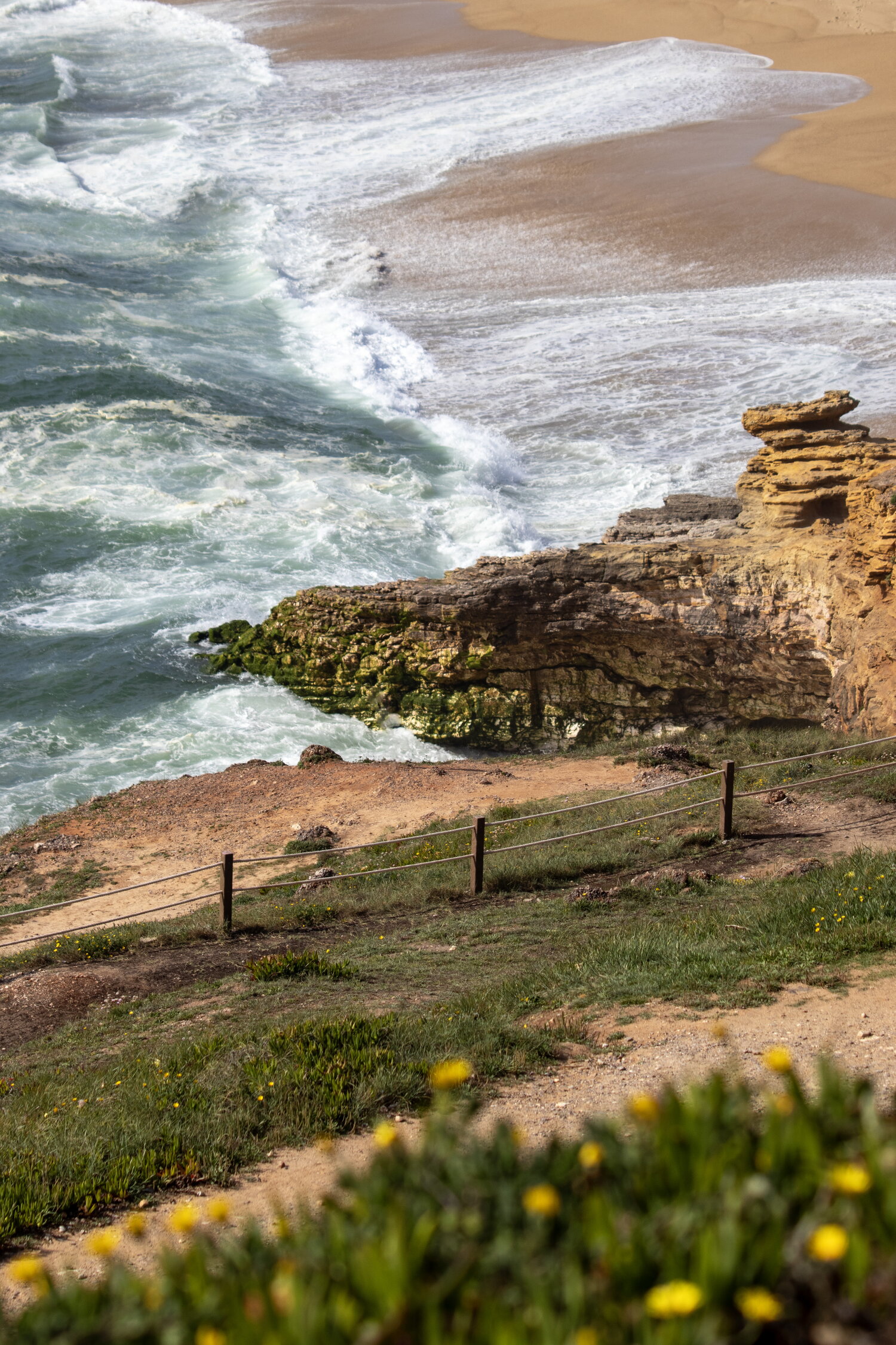 Atlantic surf below a coastal cliff