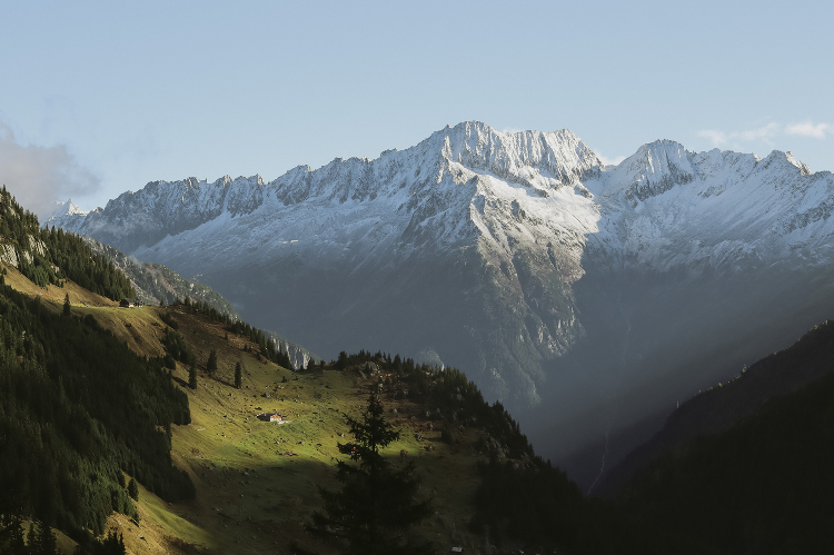 swiss alps mountains sun